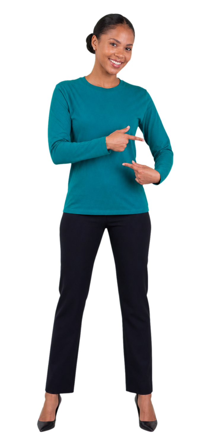 South African woman in a teal long-sleeve T-shirt pointing to a forearm branding area